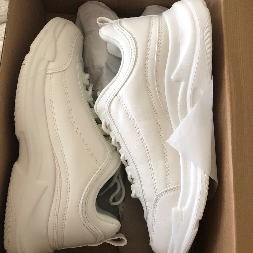 Chunky white tennis shoes